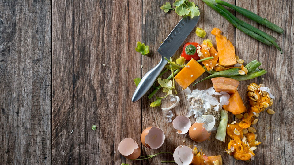 Food waste in the restaurant industry image with wood background
